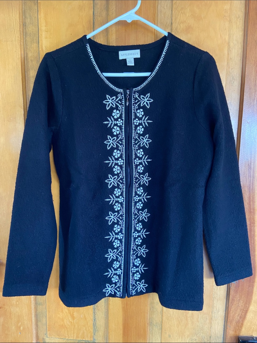 Appleseed's Black Boiled Wool Cardigan with White Floral Zip Trim